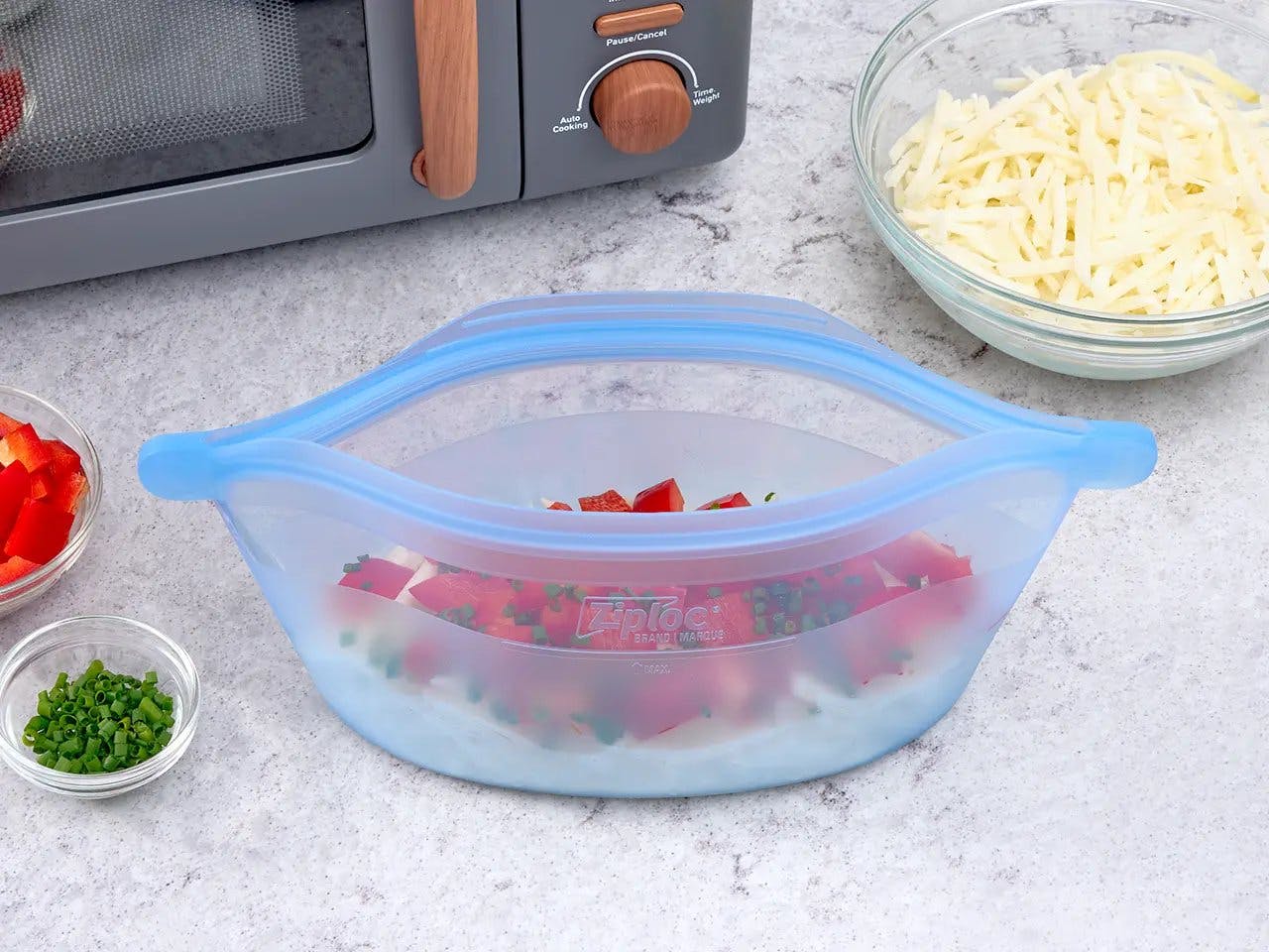 Ziploc Endurables container with potatoes, red pepper, and chives.