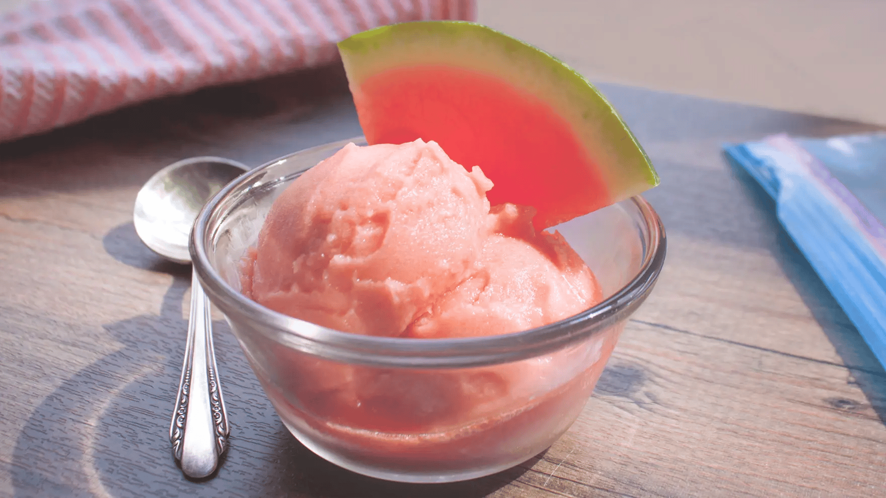Watermelon sorbet in a glass dish.