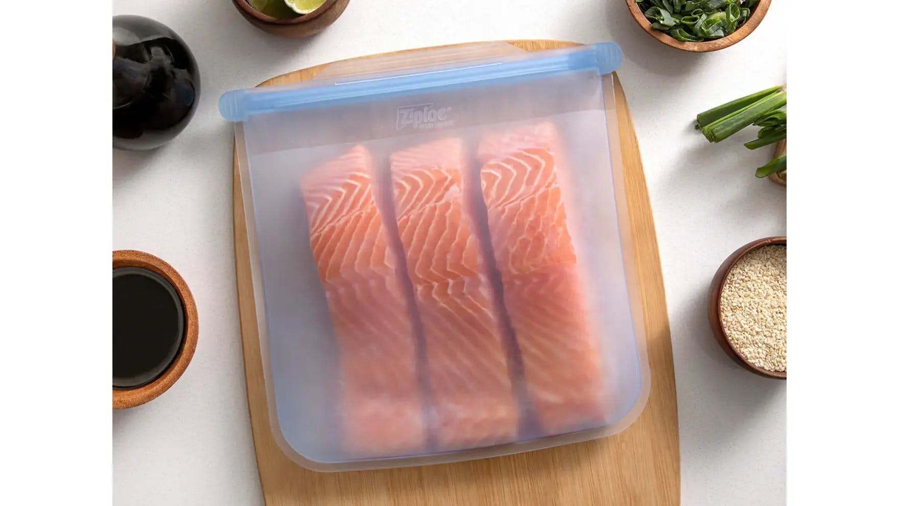 Salmon filets in Ziploc Endurables pouch on cutting board.